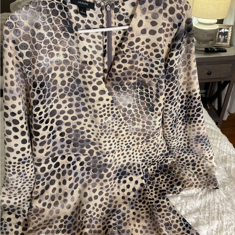 Asymmetrical Animal print in lavender and cream. Leopard print peplum blouse.